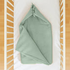 Babynest van groen biologisch katoen